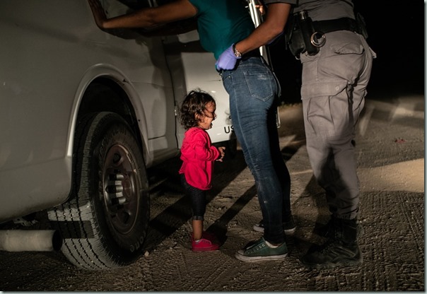 A two-year-old Honduran asylum seeker cries as her mother is searched and detained near the U.S.-Mexico border on June 12, 2018 in McAllen, Texas. They had rafted across the Rio Grande from Mexico and were detained by U.S. Border Patrol agents before being sent to a processing center. The following week the Trump administration, under pressure from the public and lawmakers, ended its contraversial policy of separating immigrant children from their parents at the U.S.-Mexico border.
