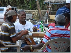 Playing domino while drinking a few cold beers is a pastime Dominicans enjoy!
