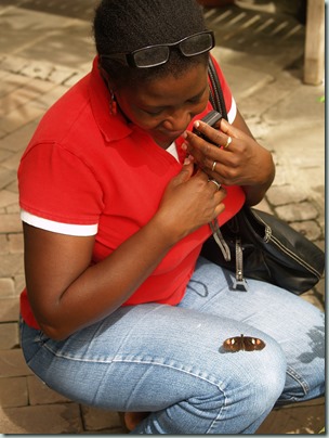 Astrid and unidentified butterfly